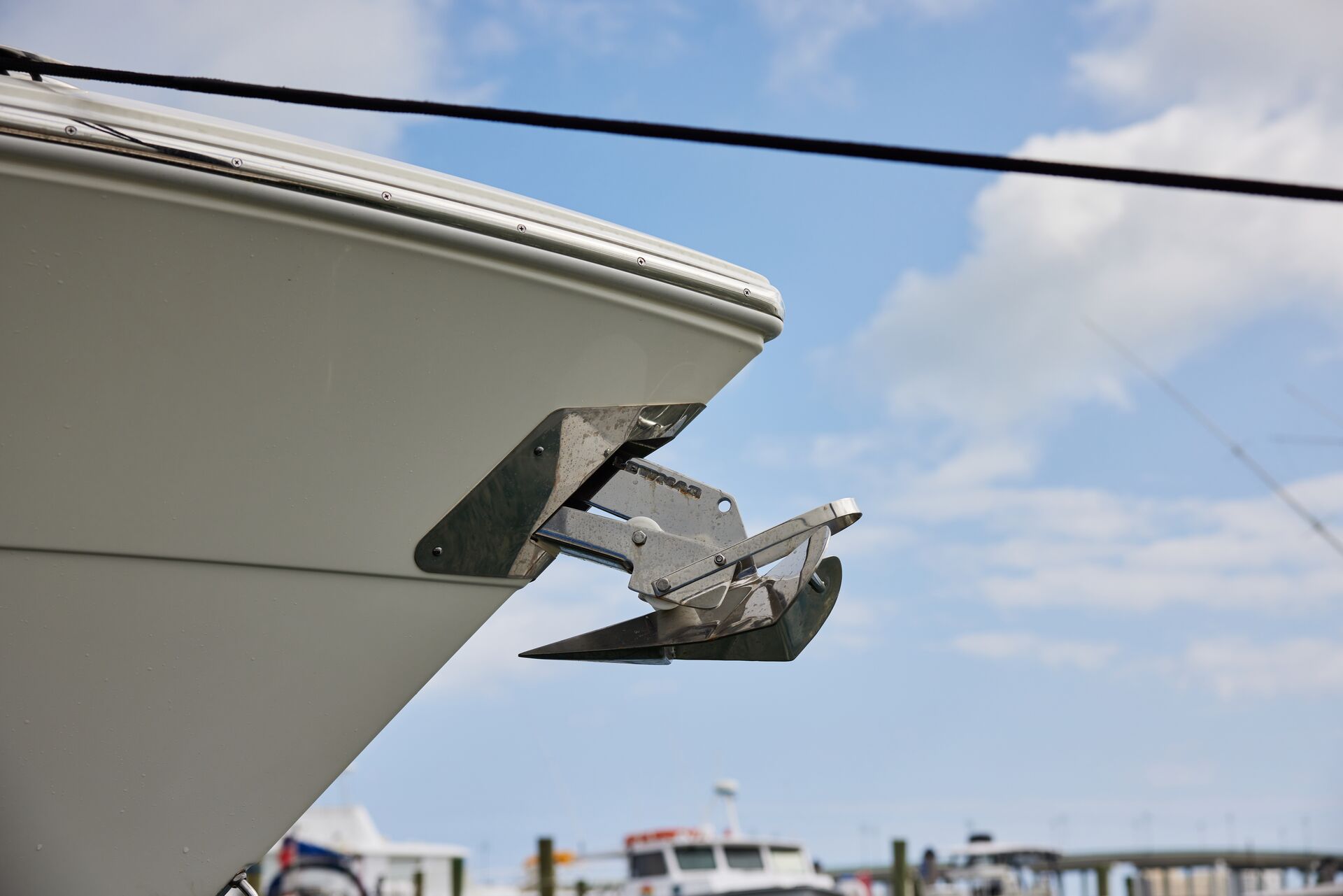 A boat at the dock showing the anchor. 